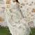 grey color silk blend fabric smart printed saree with woven border