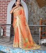 orange color silk blend fabric smart printed saree with woven border