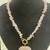 Gold plated pink stone necklace