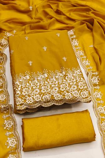 Exquisite embroidered suit set featuring floral threadwork and scalloped border dupatta