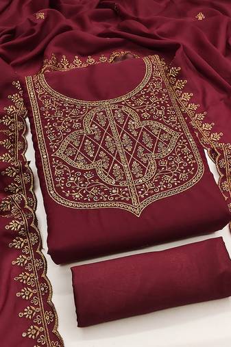 Graceful embroidered suit set featuring intricate zari work and a delicately bordered dupatta