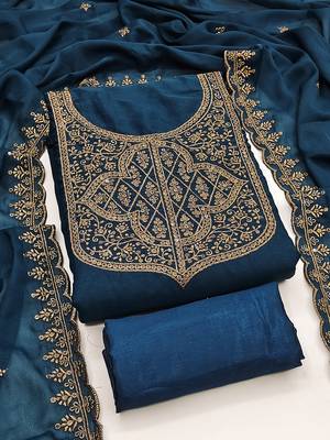 Graceful embroidered suit set featuring intricate zari work and a delicately bordered dupatta 1