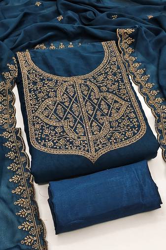 Graceful embroidered suit set featuring intricate zari work and a delicately bordered dupatta