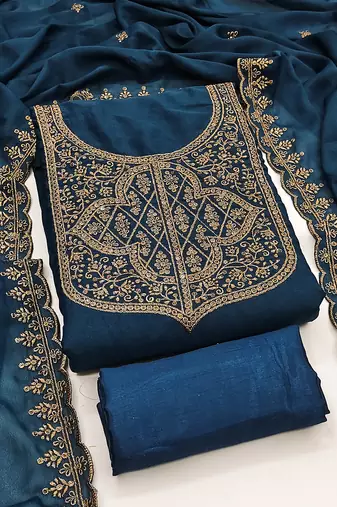 Graceful embroidered suit set featuring intricate zari work and a delicately bordered dupatta
