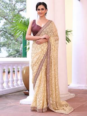 Beige color brasso fabric heavy ceremonial wear bollywood saree 1