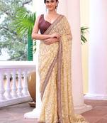 Beige color brasso fabric heavy ceremonial wear bollywood saree