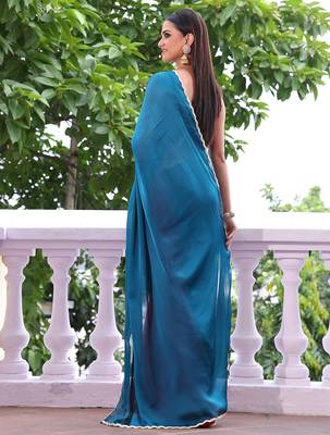 Teal chiffon heavy ceremonial wear saree 2