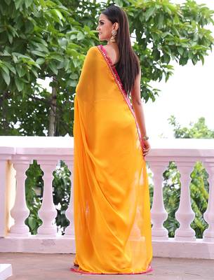 Yellow chiffon heavy ceremonial wear saree 2