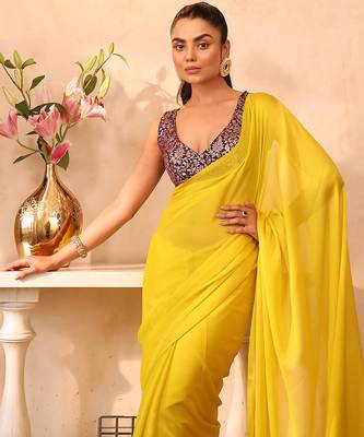 Yellow chiffon heavy ceremonial wear saree 3