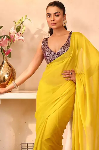 Yellow chiffon heavy ceremonial wear saree