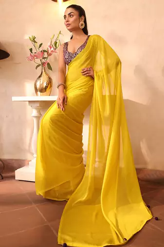 Yellow chiffon heavy ceremonial wear saree