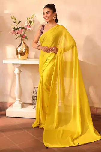 Yellow chiffon heavy ceremonial wear saree