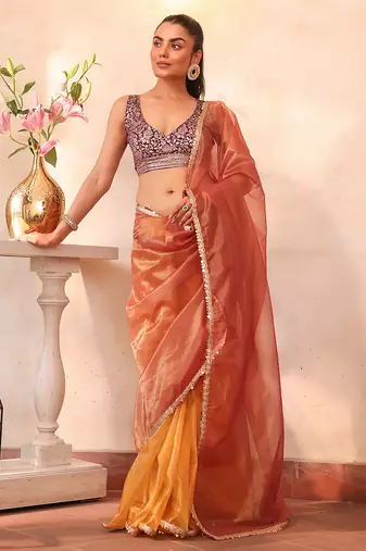 Gold color organza fabric heavy ceremonial wear bollywood saree
