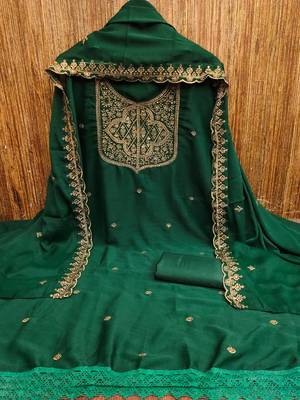 Graceful embroidered suit set featuring intricate zari work and a delicately bordered dupatta 3
