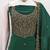 Graceful embroidered suit set featuring intricate zari work and a delicately bordered dupatta