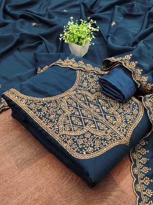 Graceful embroidered suit set featuring intricate zari work and a delicately bordered dupatta 2