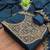 Graceful embroidered suit set featuring intricate zari work and a delicately bordered dupatta