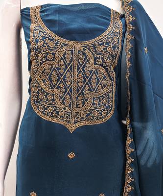 Graceful embroidered suit set featuring intricate zari work and a delicately bordered dupatta 4