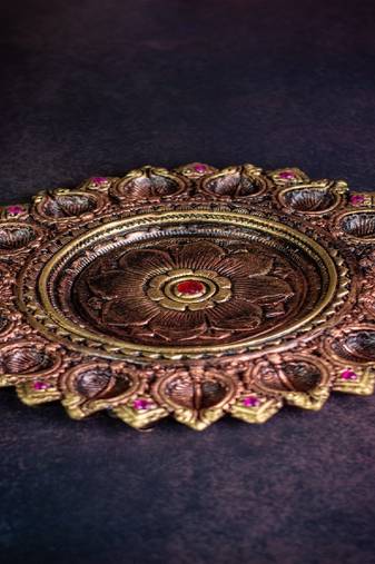 The handicraftian 14 diya plate