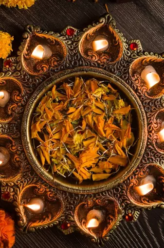 The handicraftian 9 diya plate