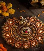 The handicraftian peacock 11 diya plate