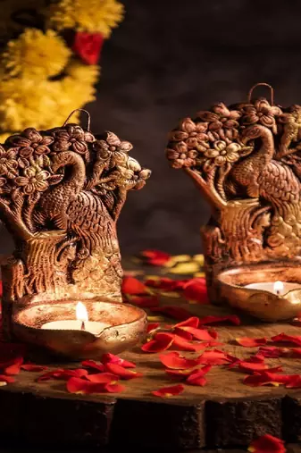 The handicraftian tree peacock hanging diya set