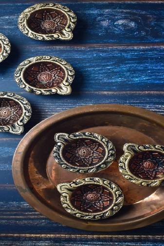 The handicraftian curve  diya set of 12