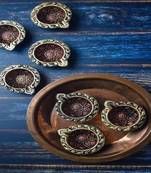 The handicraftian curve  diya set of 12