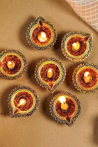 The handicraftian orchid diya set of 12