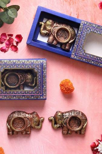 The handicraftian elephant t light set of 4