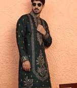 Cotton silk floral and zari embroidered green kurta