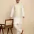 Silk blend solid cream kurta and churidar with zari embroidered cream nehru jacket