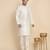 Silk blend solid cream kurta and churidar with zari embroidered cream nehru jacket
