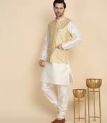 Silk blend solid cream kurta and churidar with zari embroidered beige nehru jacket