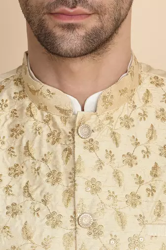 Silk blend solid cream kurta and churidar with zari embroidered beige nehru jacket