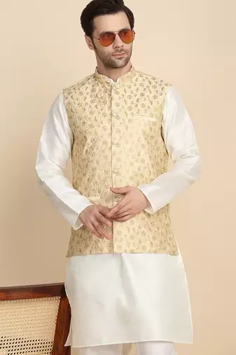 Silk blend solid cream kurta and churidar with zari embroidered beige nehru jacket