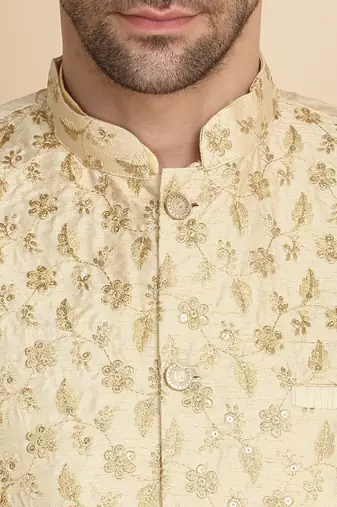 Silk blend solid beige kurta and churidar with zari embroidered beige nehru jacket