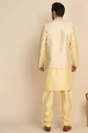 Silk blend solid beige kurta and churidar with zari embroidered beige nehru jacket