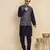 Silk blend solid navy blue kurta and churidar with zari embroidered navy blue nehru jacket