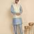 Silk blend solid sky blue kurta and churidar with zari embroidered cream nehru jacket