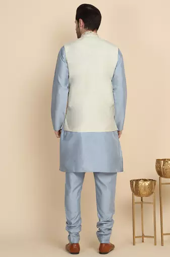Silk blend solid sky blue kurta and churidar with zari embroidered cream nehru jacket