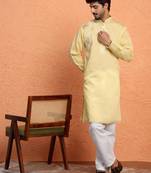 Cotton silk sequinced embroidered yellow kurta with trouser pant