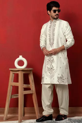Cotton silk floral and zari embroidered cream kurta with salwar