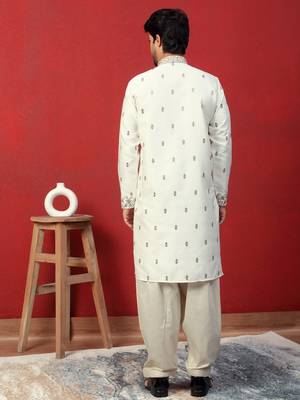Cotton silk floral and zari embroidered cream kurta with salwar 3