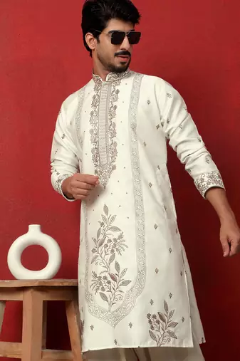 Cotton silk floral and zari embroidered cream kurta with salwar