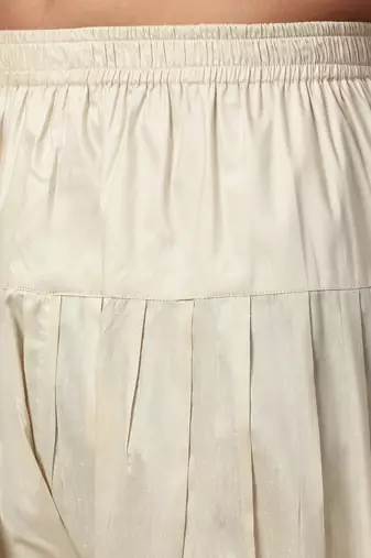 Cotton silk floral and zari embroidered cream kurta with salwar