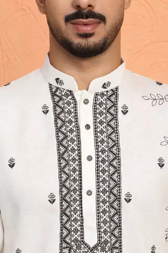 Cotton yoke design embroidered cream kurta with trouser pant
