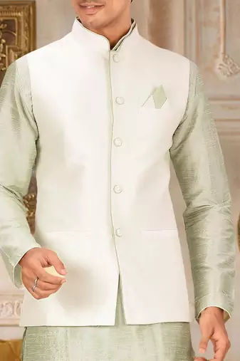 Cream dupon art silk kurta, jacket with matching churidar