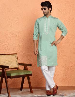 Cotton silk yoke design embroidered green kurta with trouser pant 1