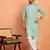 Cotton silk yoke design embroidered green kurta with trouser pant